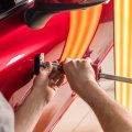 Using a Dent Puller: An Ultimate Guide for Auto Body Repair and Painting Enthusiasts